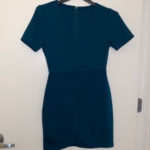 Green mini dress with sleeves
